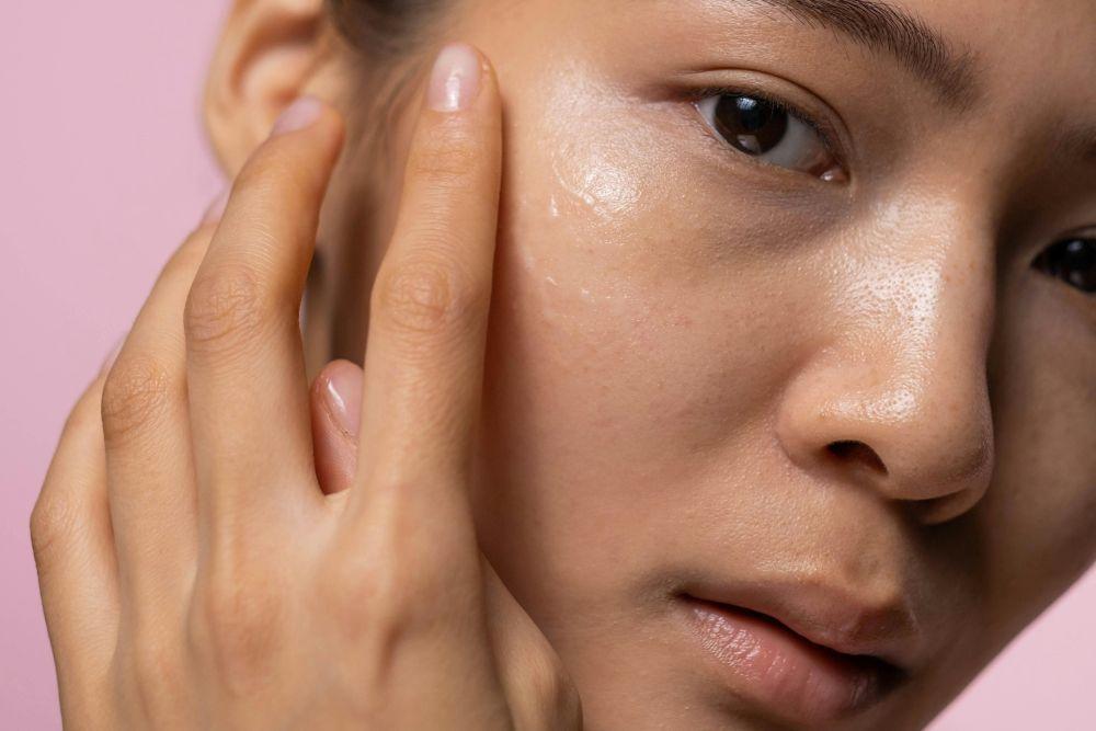 Invity importance of using NAD+ skincare - Asian woman showing application Image: Pexels.com/Ron Lach